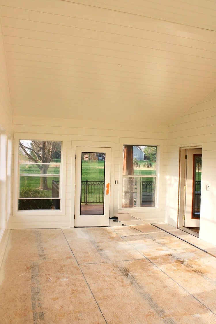 White sunroom walls, ceiling and door trim painted by Mission Painting in Grimes, Iowa