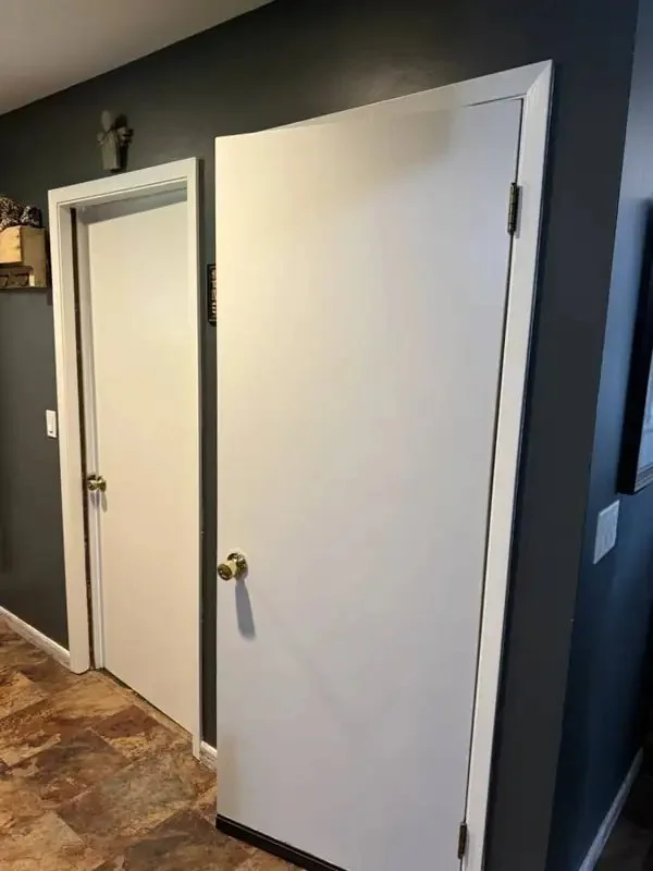 White interior doors in a hallway painted by Mission Painting in Norwalk, Iowa