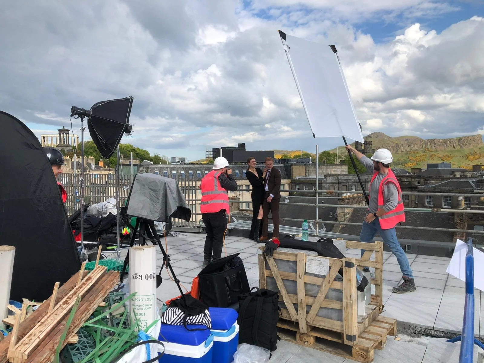 Crew, lighting and models working on the rooftop at St James Quarter.