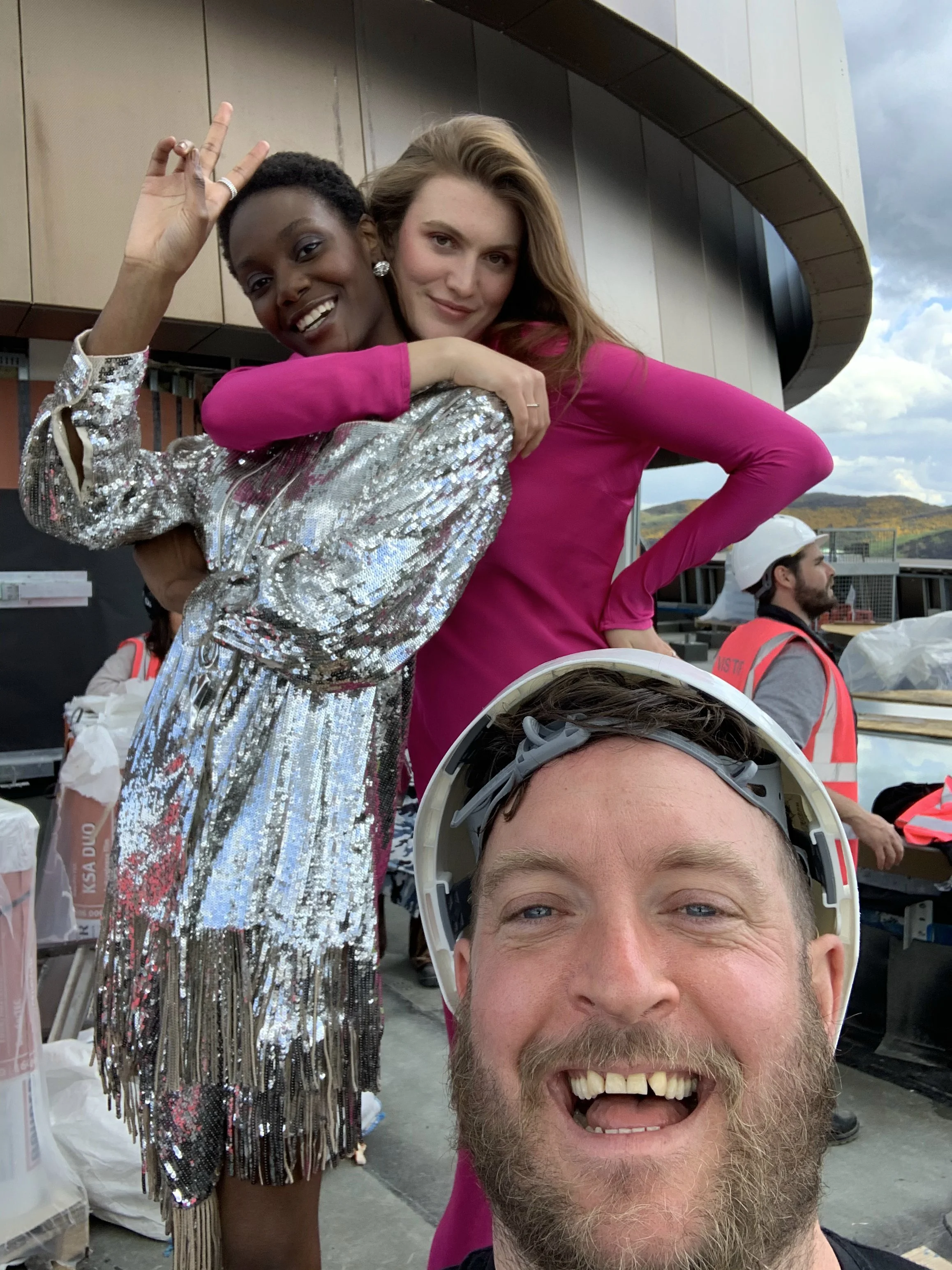Jon Enoch and two models on the rooftop during the St James Quarter shoot.