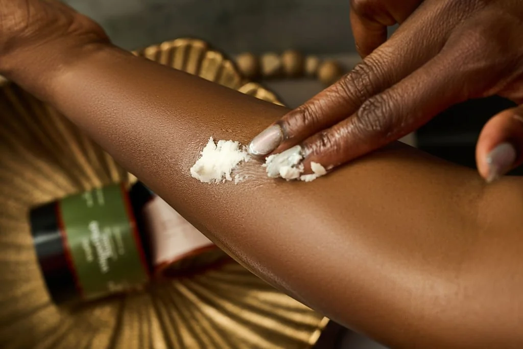 Amaria body butter being applied to skin