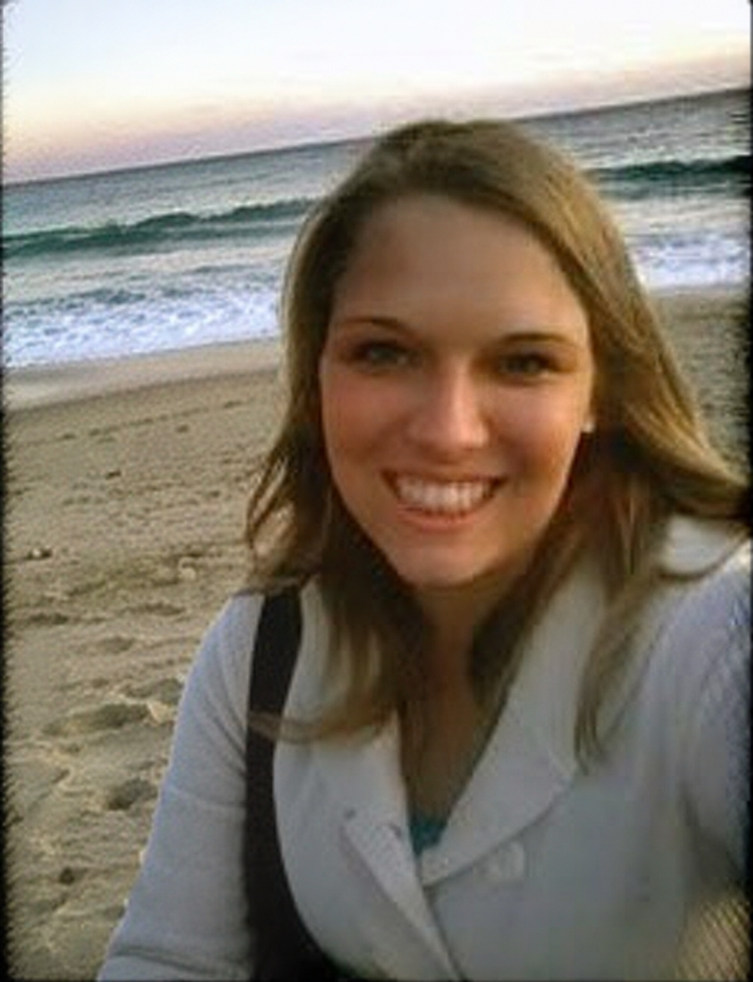 An early photograph of Jessica smiling at the beach