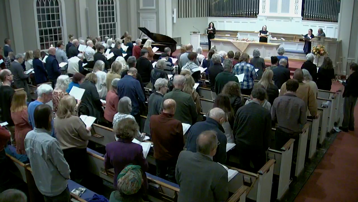 The congregation of North Shore Presbyterian standing to sing during worship