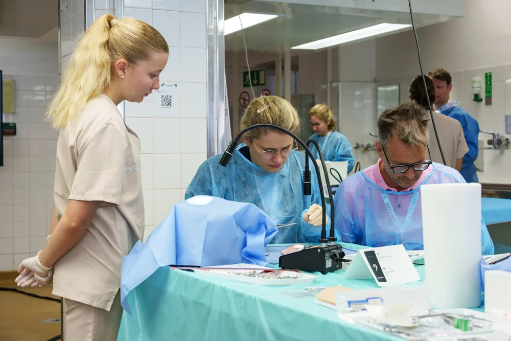 Two surgeons at their station during LidSUMMIT Tirol 2026 at the Medical University of Innsbruck