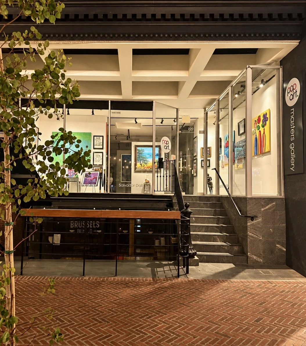 Pop Art Masters gallery at night with the brick promenade in Laguna Beach