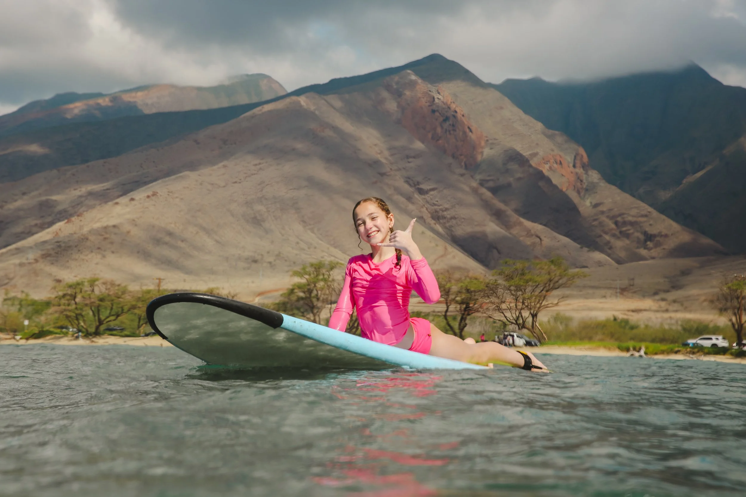 Surfer practicing during a beginner surf lesson