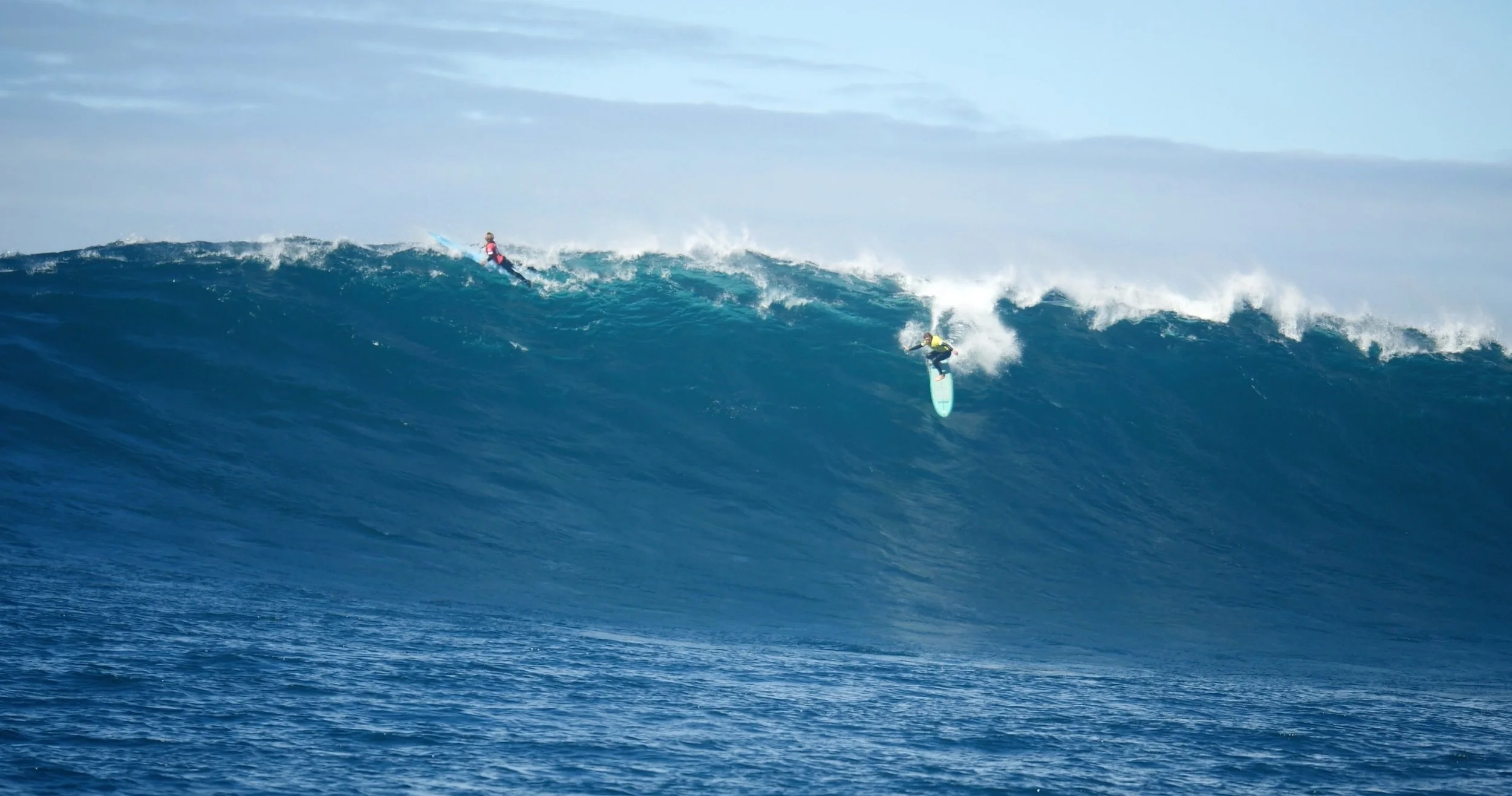 Katie McConnell surfing in Maui