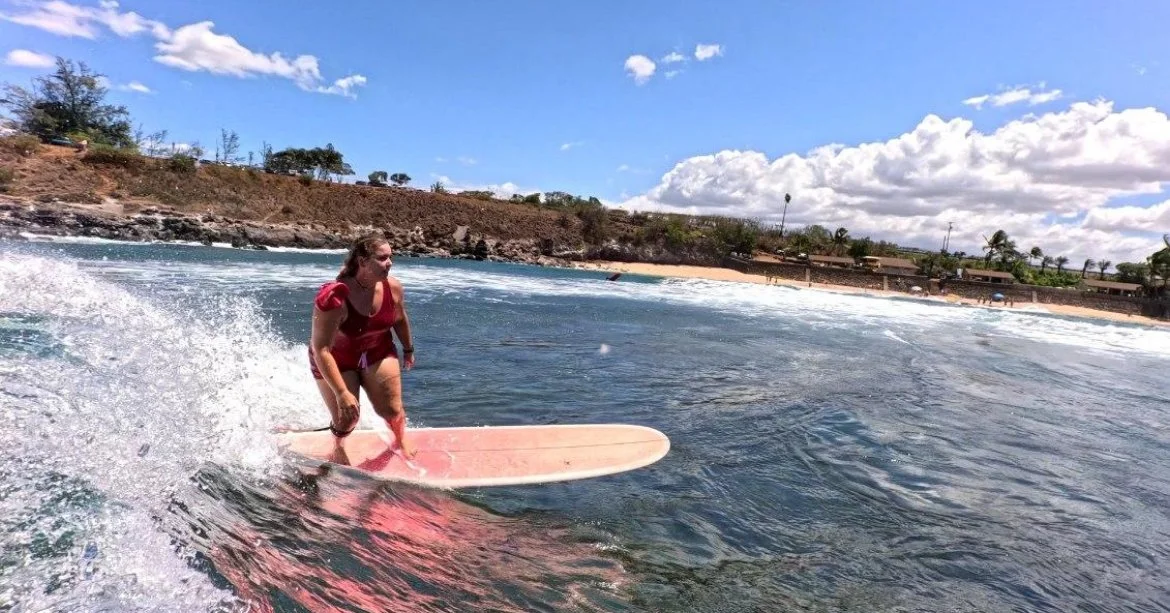 Ginger Prados surfing and enjoying the ocean in Maui