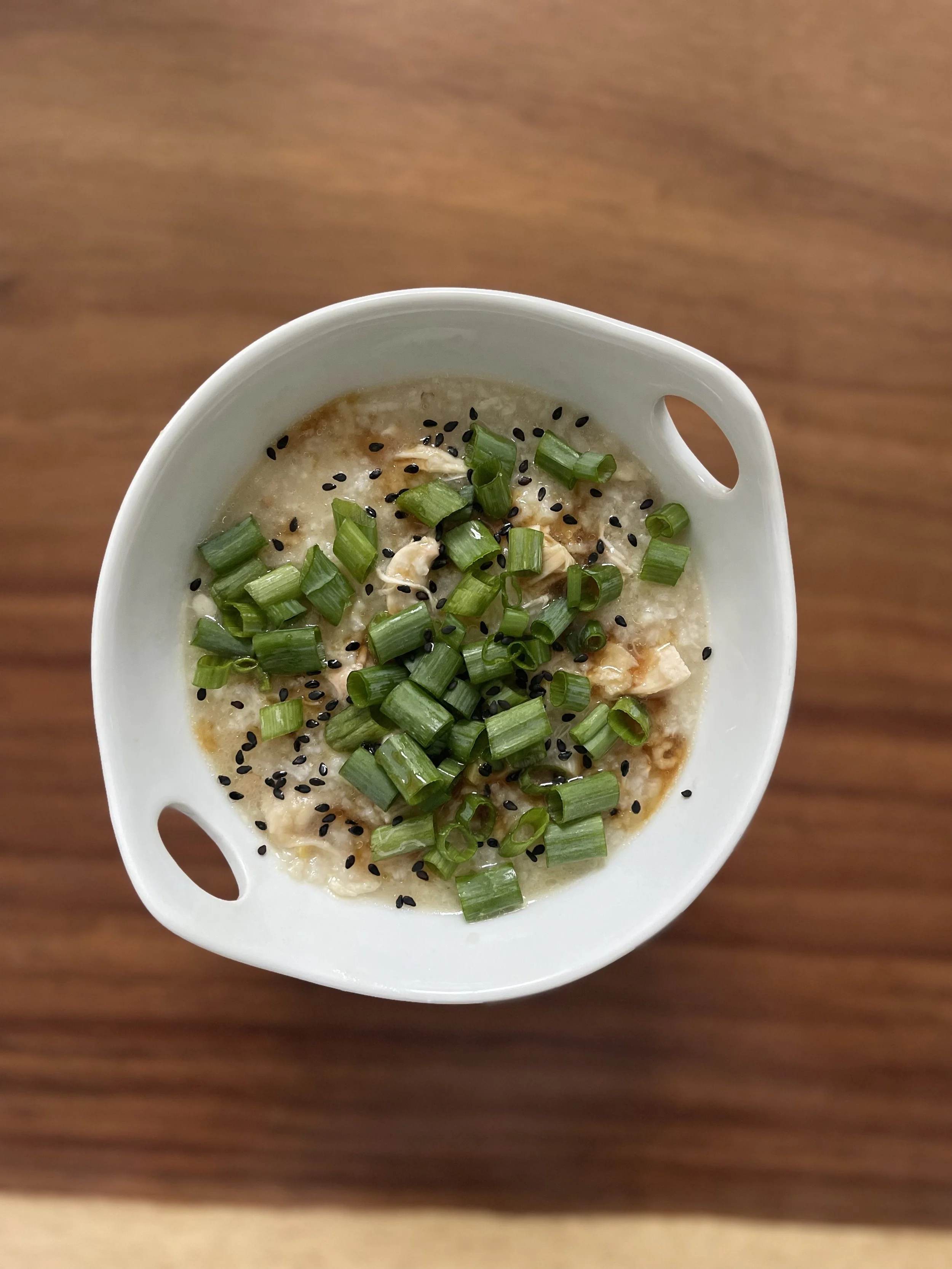 Chicken Congee with black sesame seeds