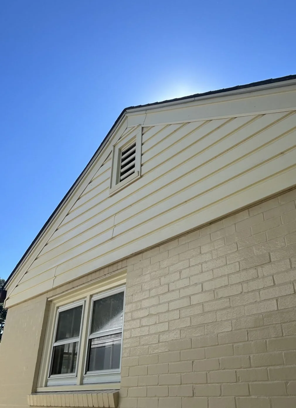 House siding and brick after cleaning