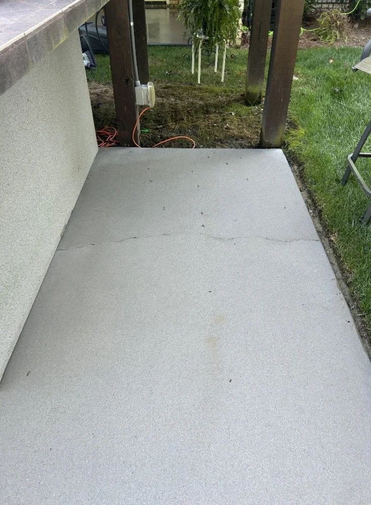 Concrete walkway after pressure washing