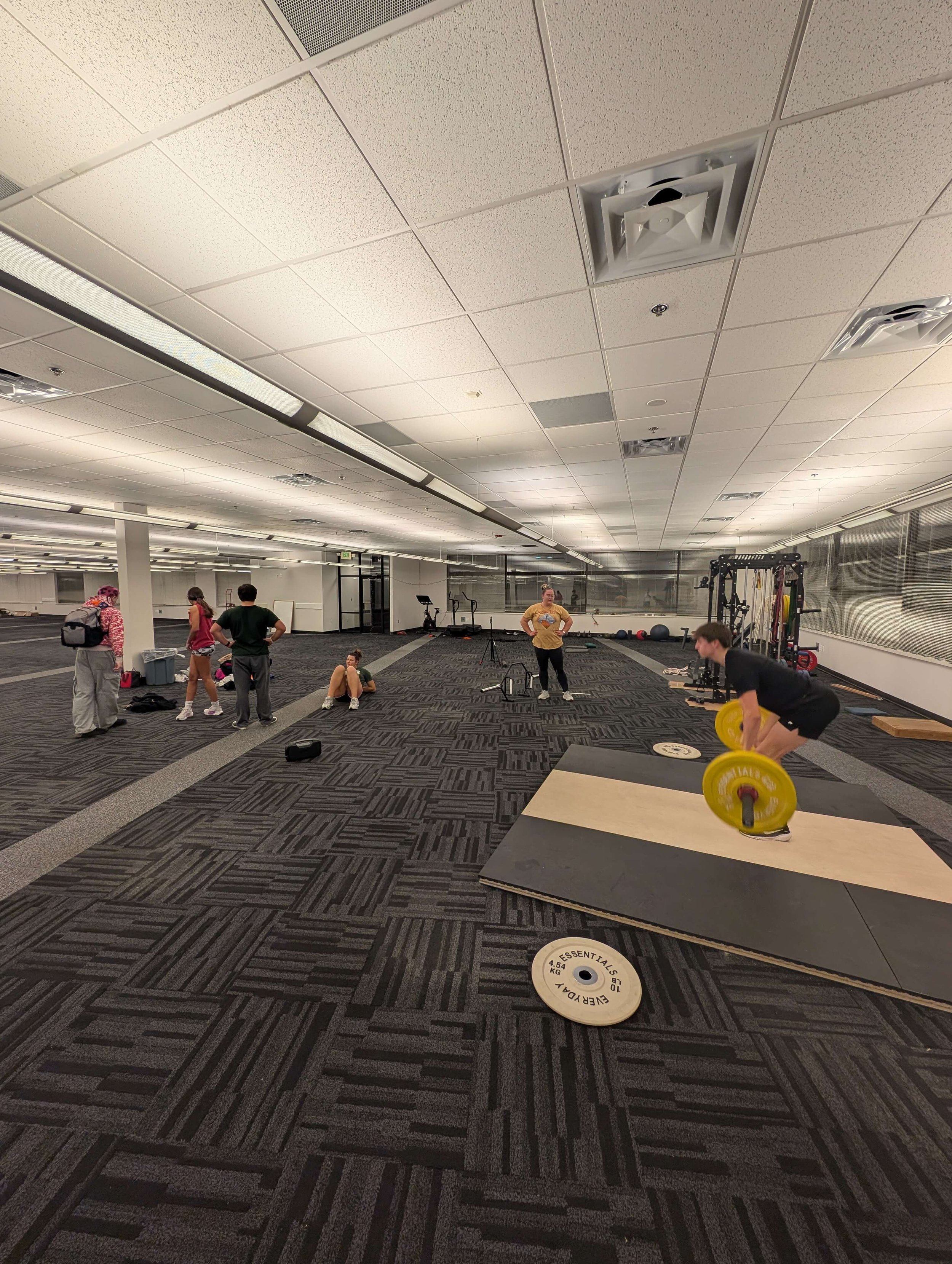 RYFT athletes training in the indoor track and field facility
