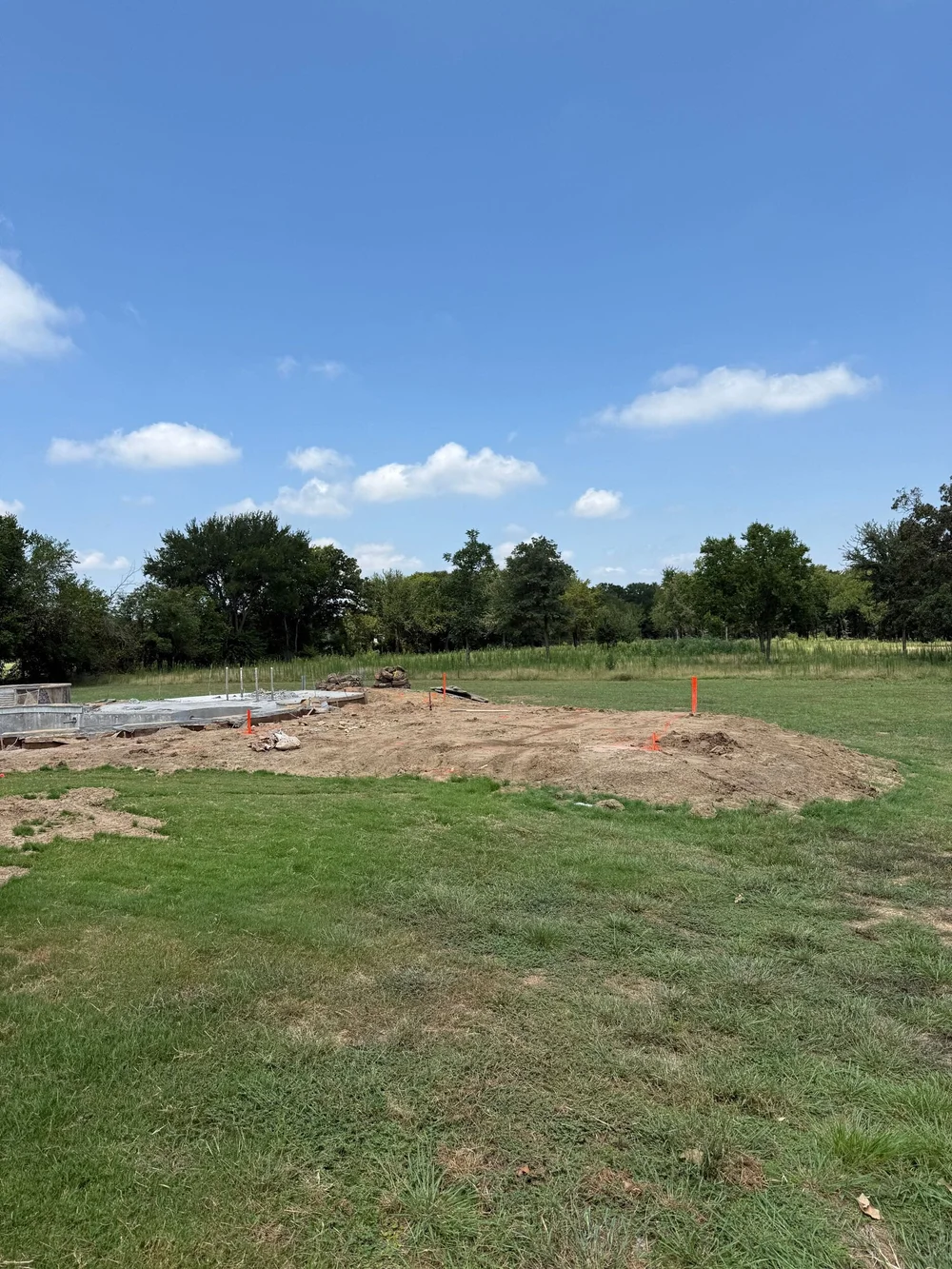 Munday project site preparation beside the pool before pavilion construction in Burleson