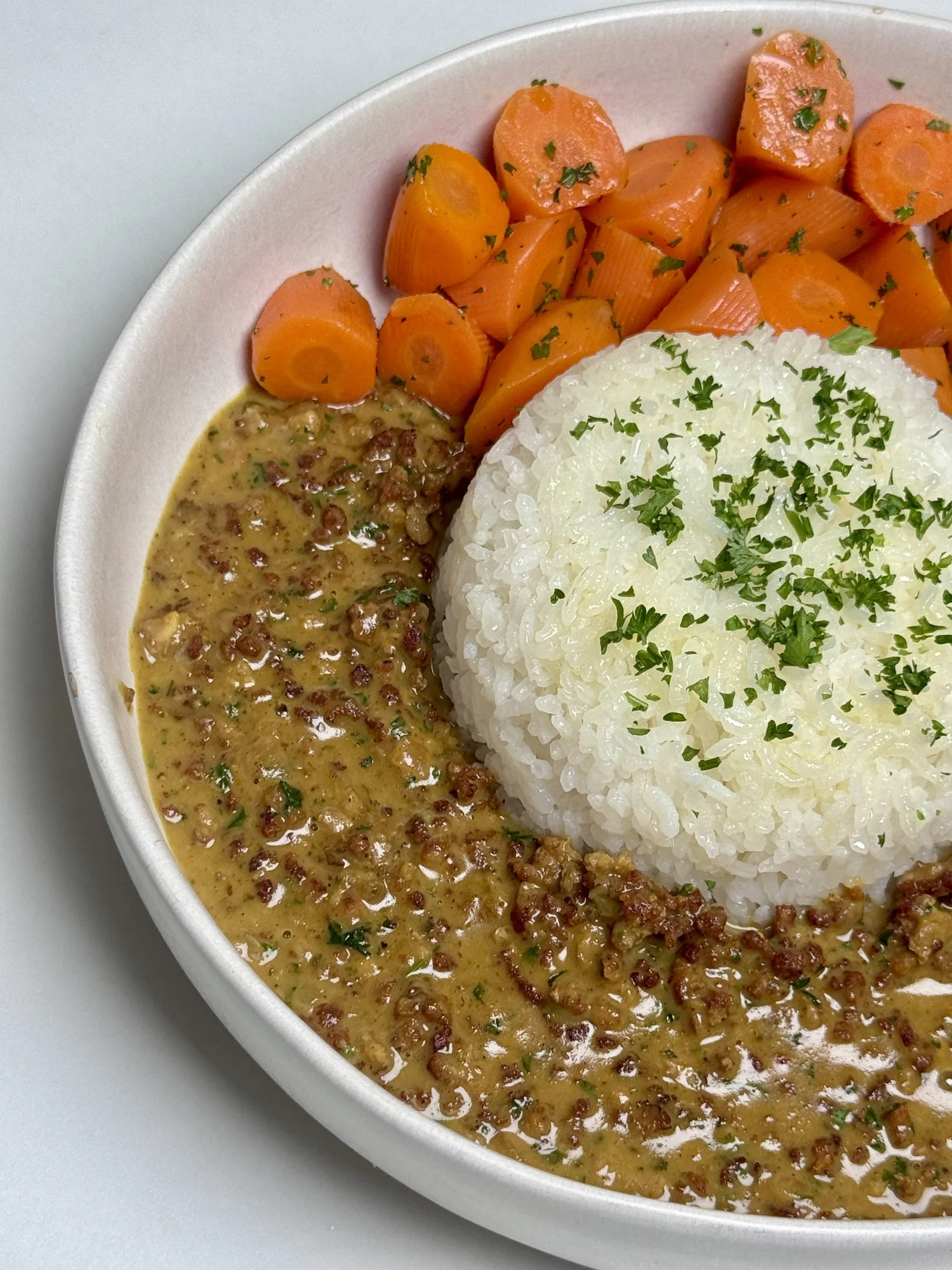 Curry Ghackets with rice and carrots