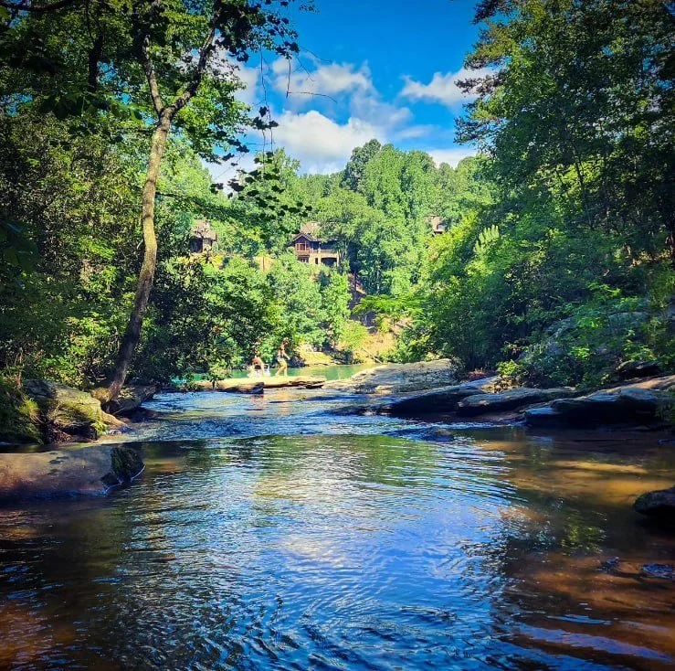 Stunning views of the Blue Ridge escarpment at Keowee-Toxaway, a hidden gem connecting the mountains and lakes near the Riverdaze property.