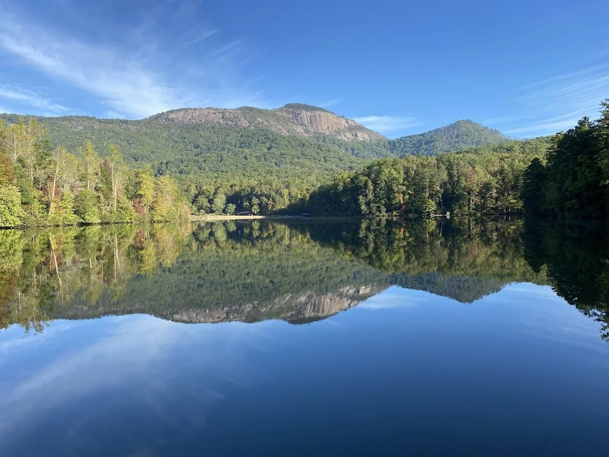 An iconic view of the Blue Ridge foothills from Table Rock State Park, the premier mountain hiking destination located just minutes from the Riverdaze cabin.