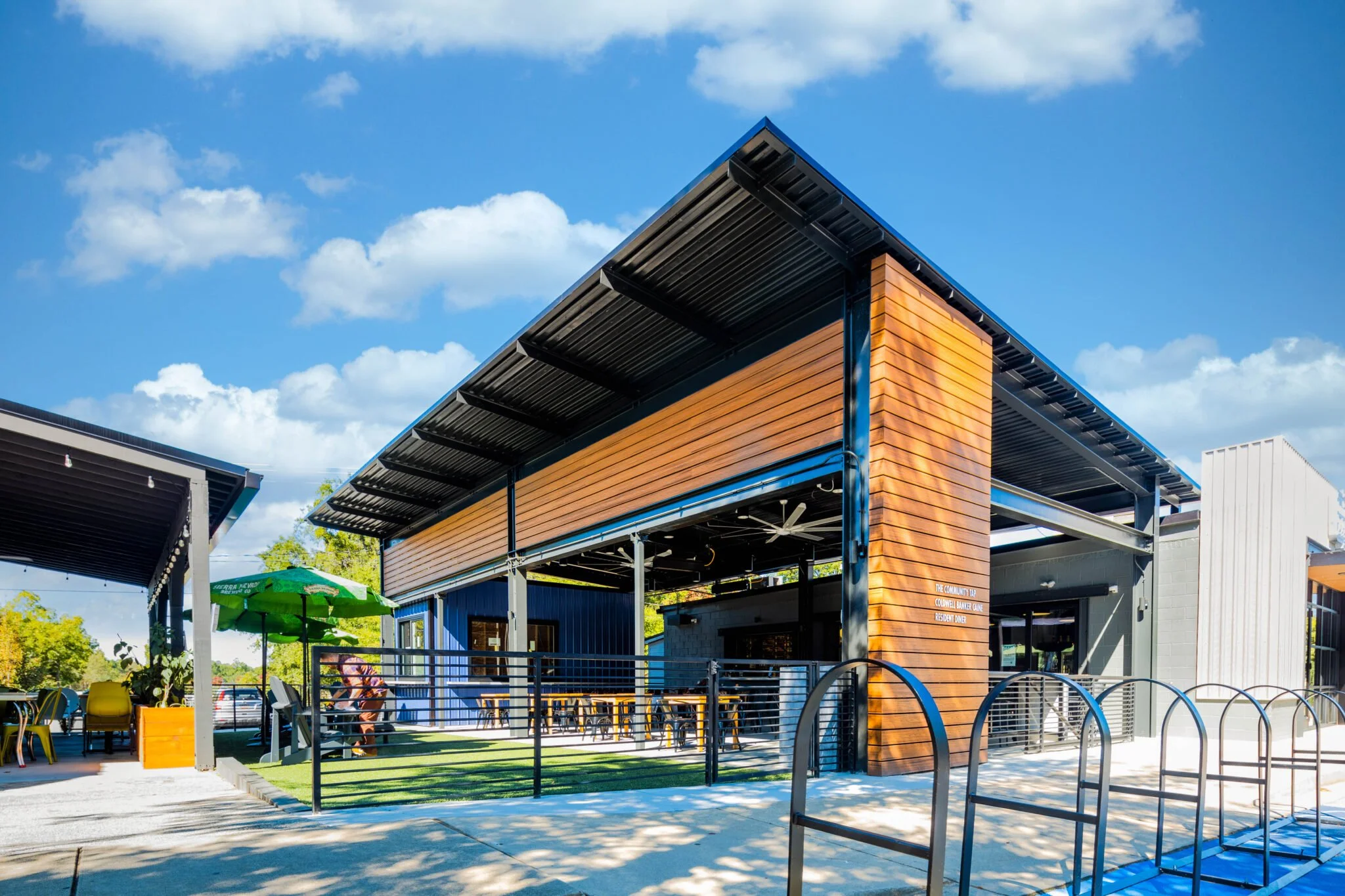 A curated craft beer and wine shop at The Community Tap in Travelers Rest, perfect for enjoying a pint or stocking the Riverdaze cabin.