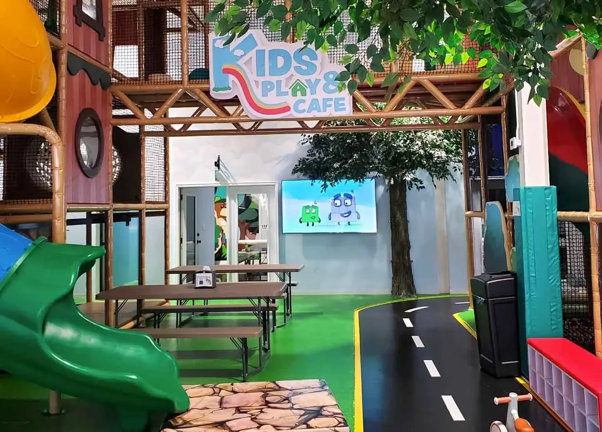A safe and relaxed indoor playground at Kids Play & Cafe in Easley, providing a fun energy-burn for little ones visiting Riverdaze.