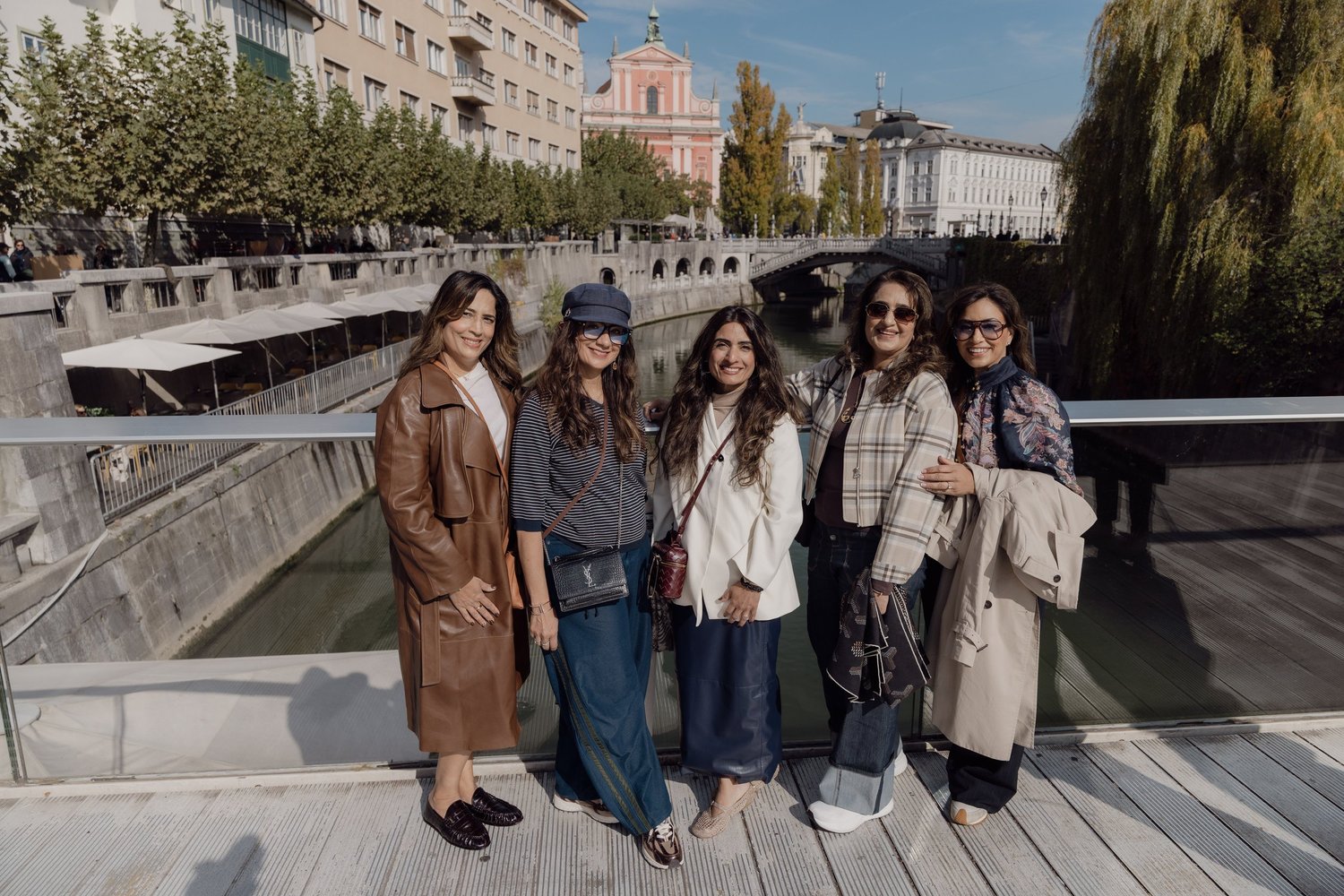 Five friends on Butchers’ Bridge beside the Ljubljanica in Ljubljana.