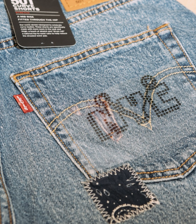 Rhinestone application on denim at the Levi's World Cup customization station NYC