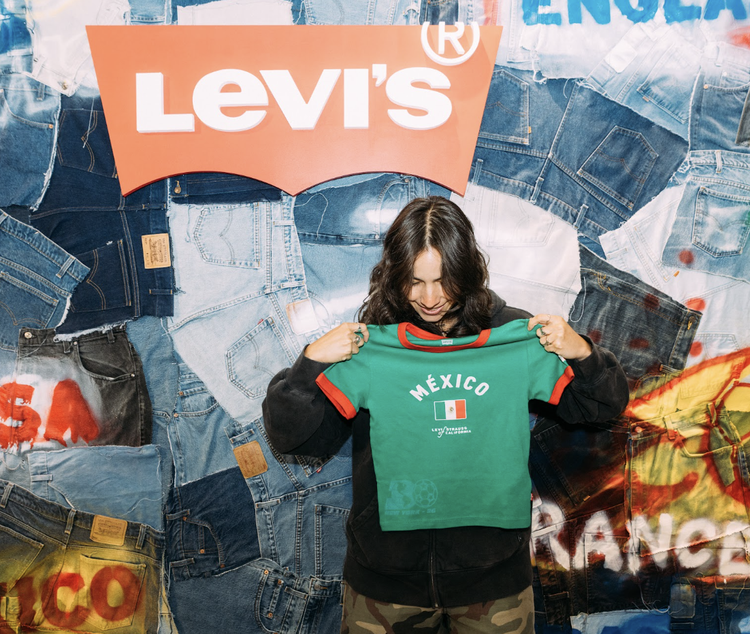 Guest with a custom shirt at the live Levi's World Cup customization workshop