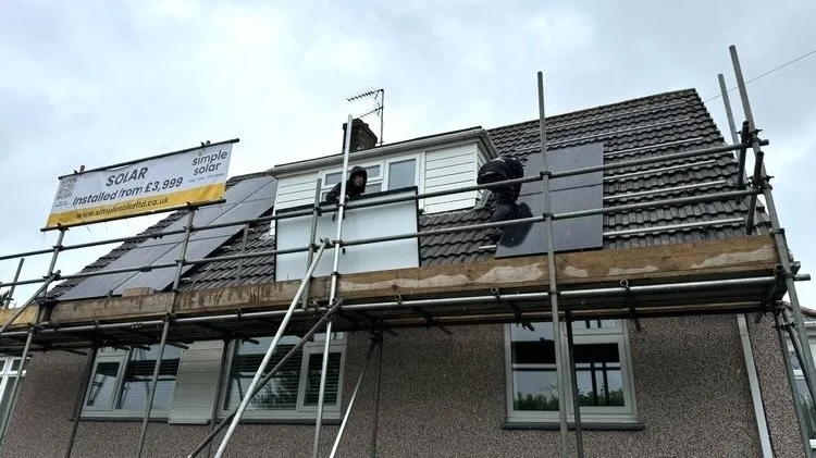 An image showing Simple Solar Ltd. scaffolding for installing solar panels as an energy savings measure.