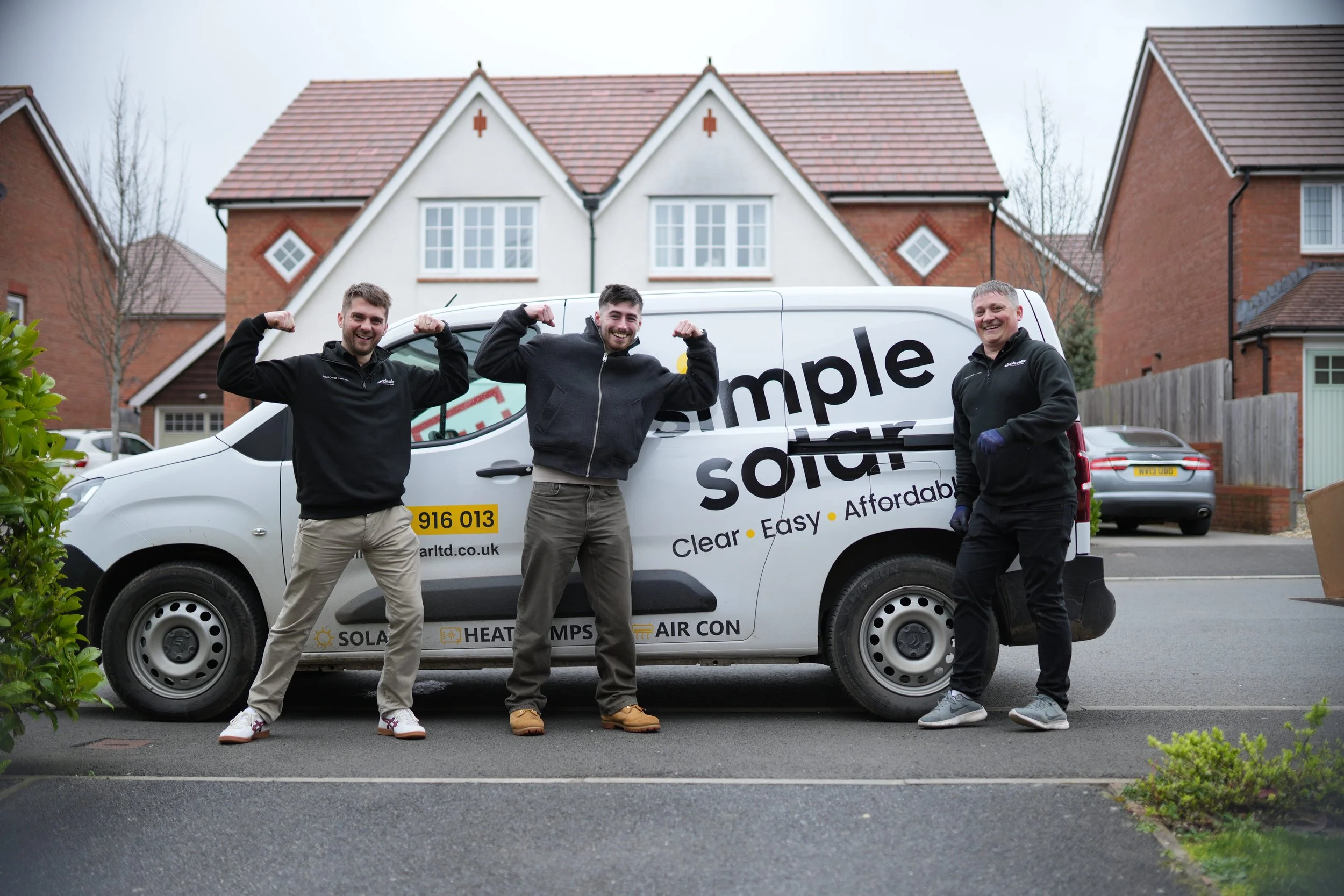 Simple Solar team standing beside a branded Simple Solar van.