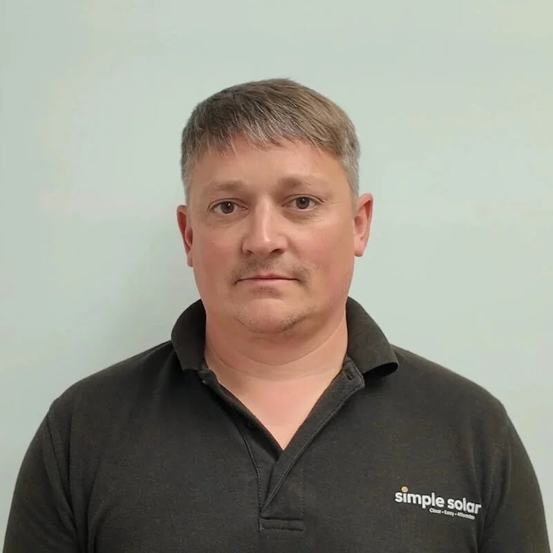 Ben Quick, Director at Simple Solar, photographed wearing a Simple Solar polo shirt.