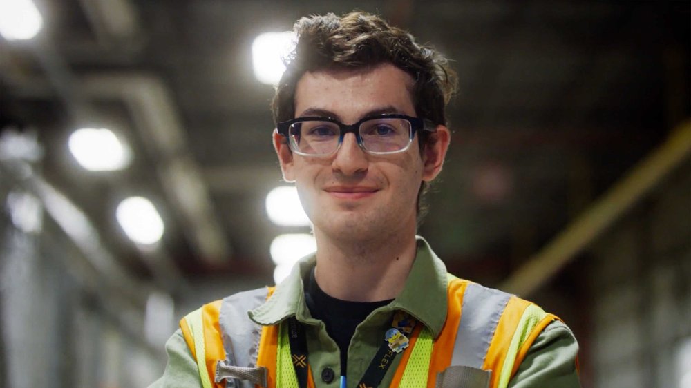 Amazon warehouse employee Jacob Misavage in Wisconsin featured in internal communications documentary series.