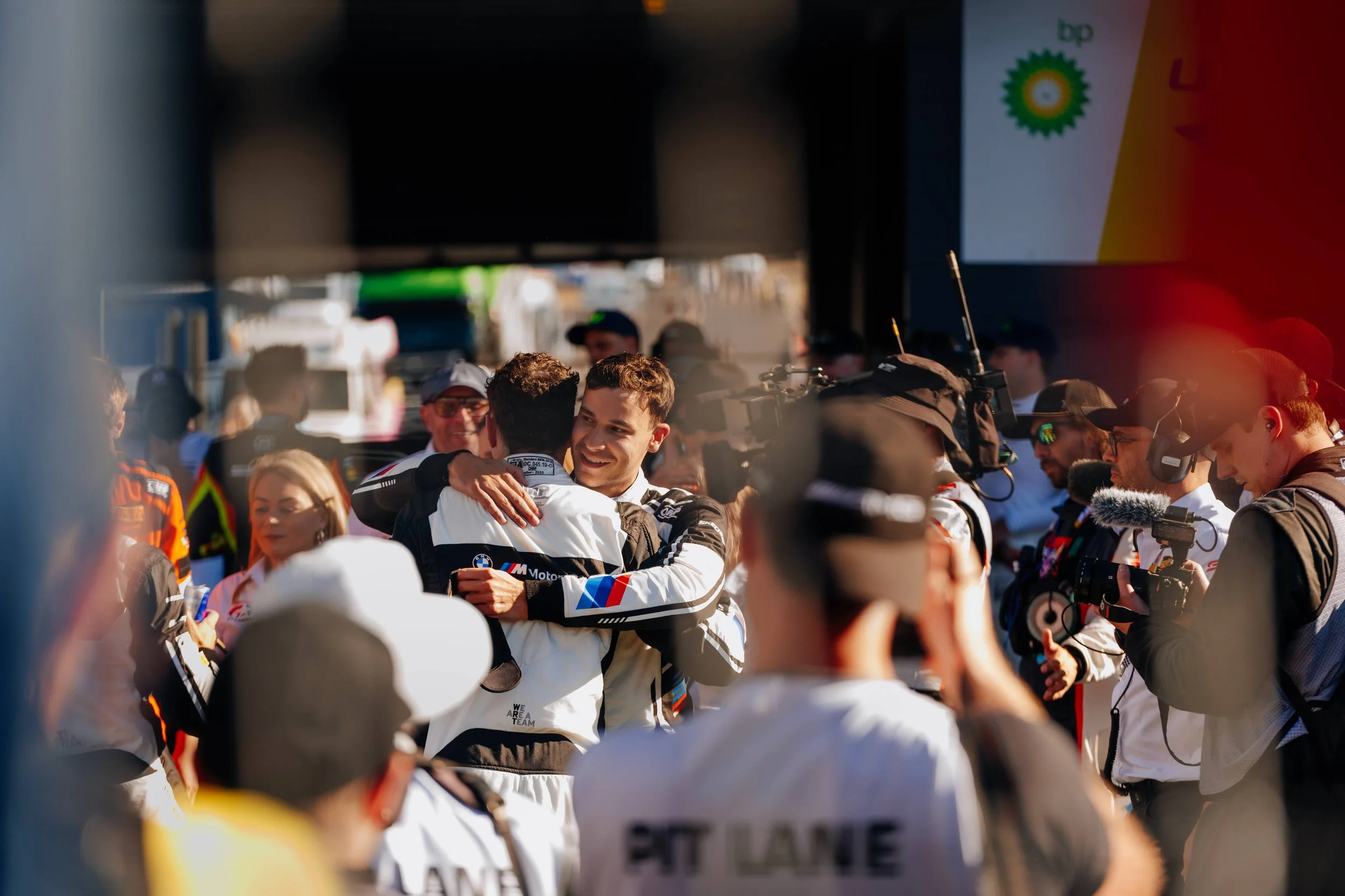 BMW victory podium — motorsport coverage