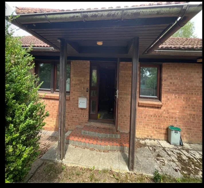 Front door before renovation - property refurbishment UK