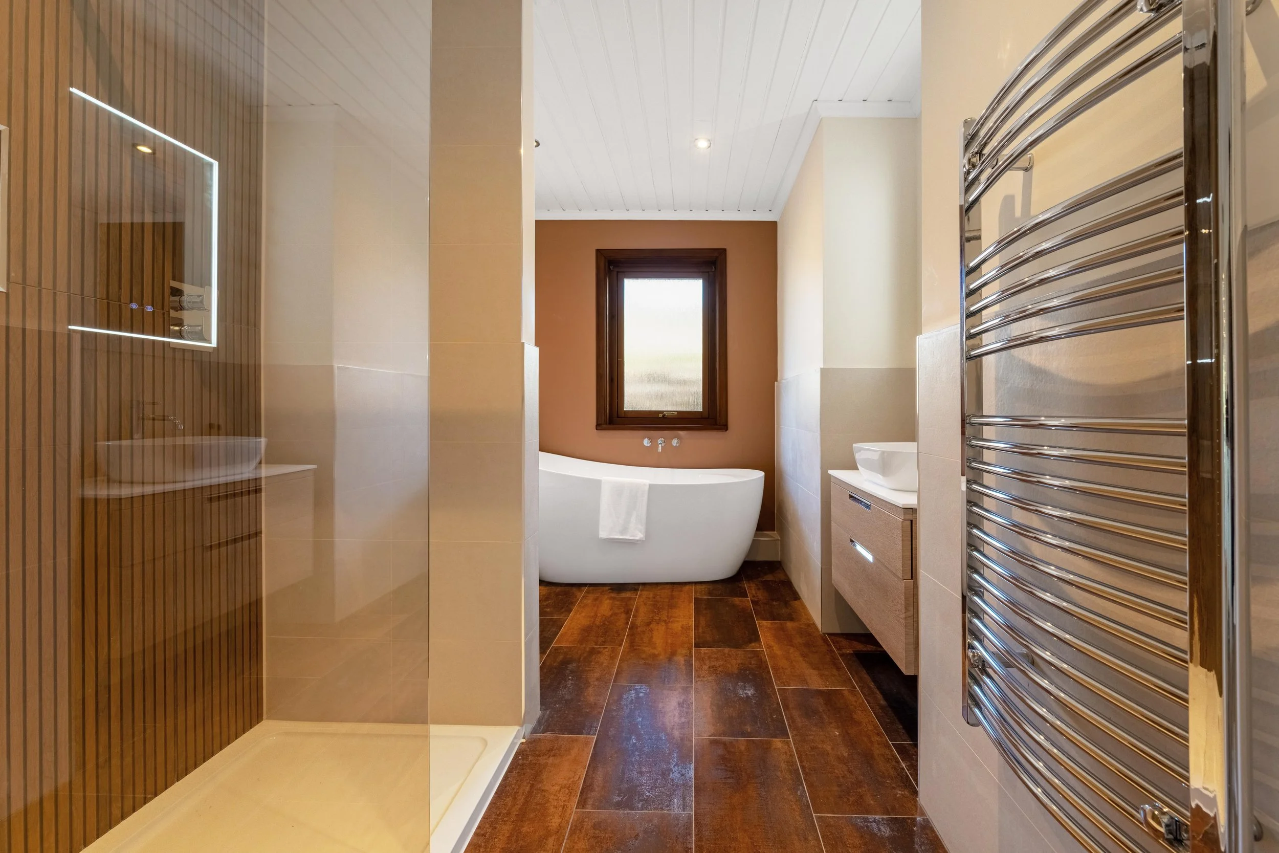 Luxury bathroom renovation with freestanding bath and timber panelling - The Chic Relic UK