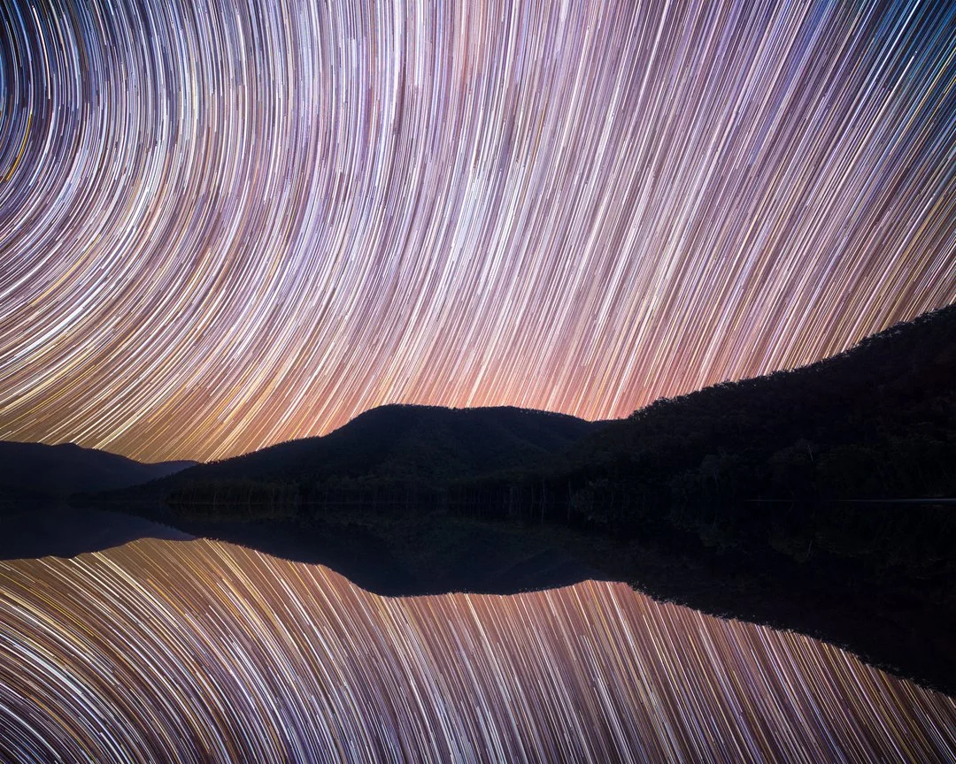 Star trail over Borumba Dam at night