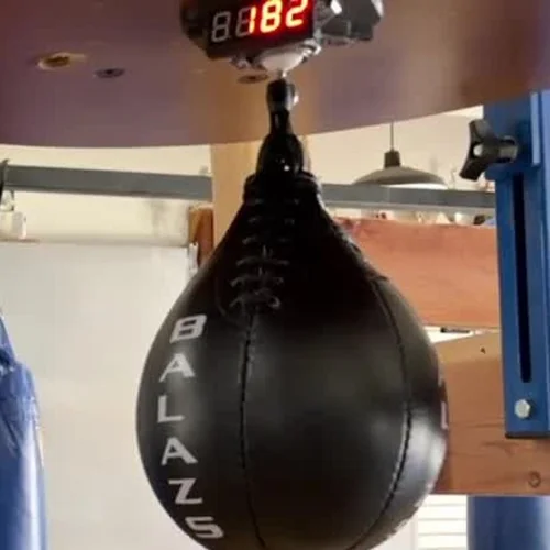 The LED screen on a real counter reading 182, under a speed bag platform