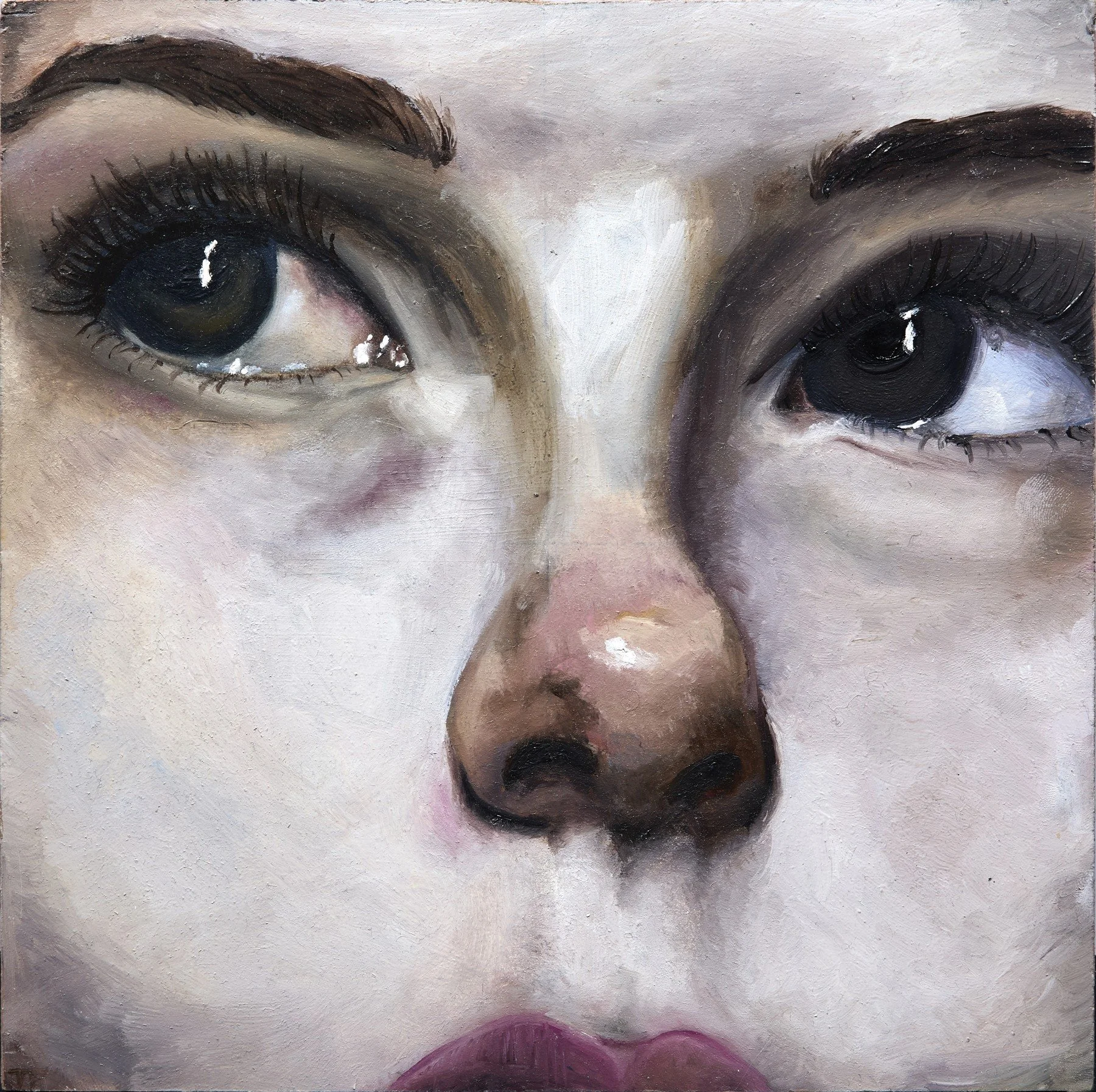 Close-up painted face with dark eyes looking to one side and a softly lit nose