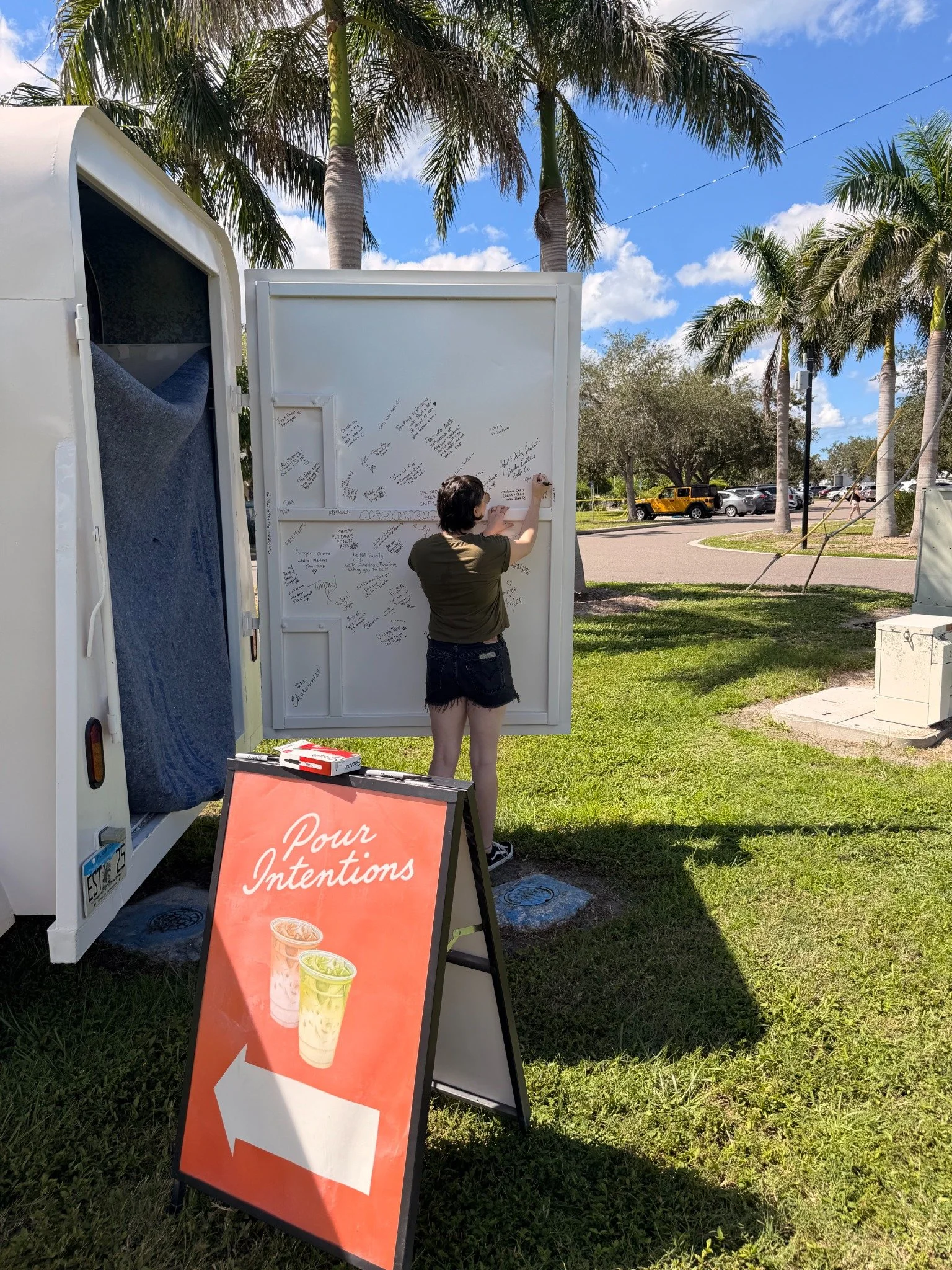 Pour Intentions coffee trailer and welcome sign