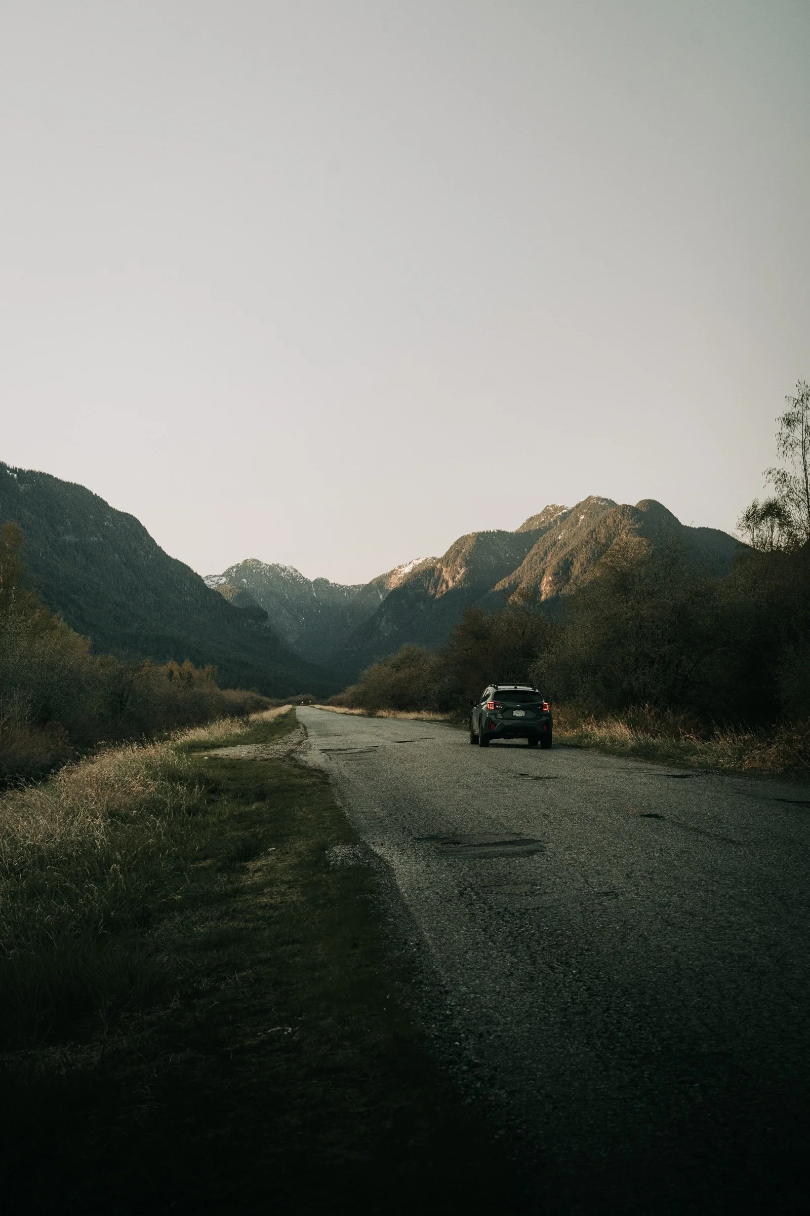 Abby's Subaru on the road by Pitt Lake