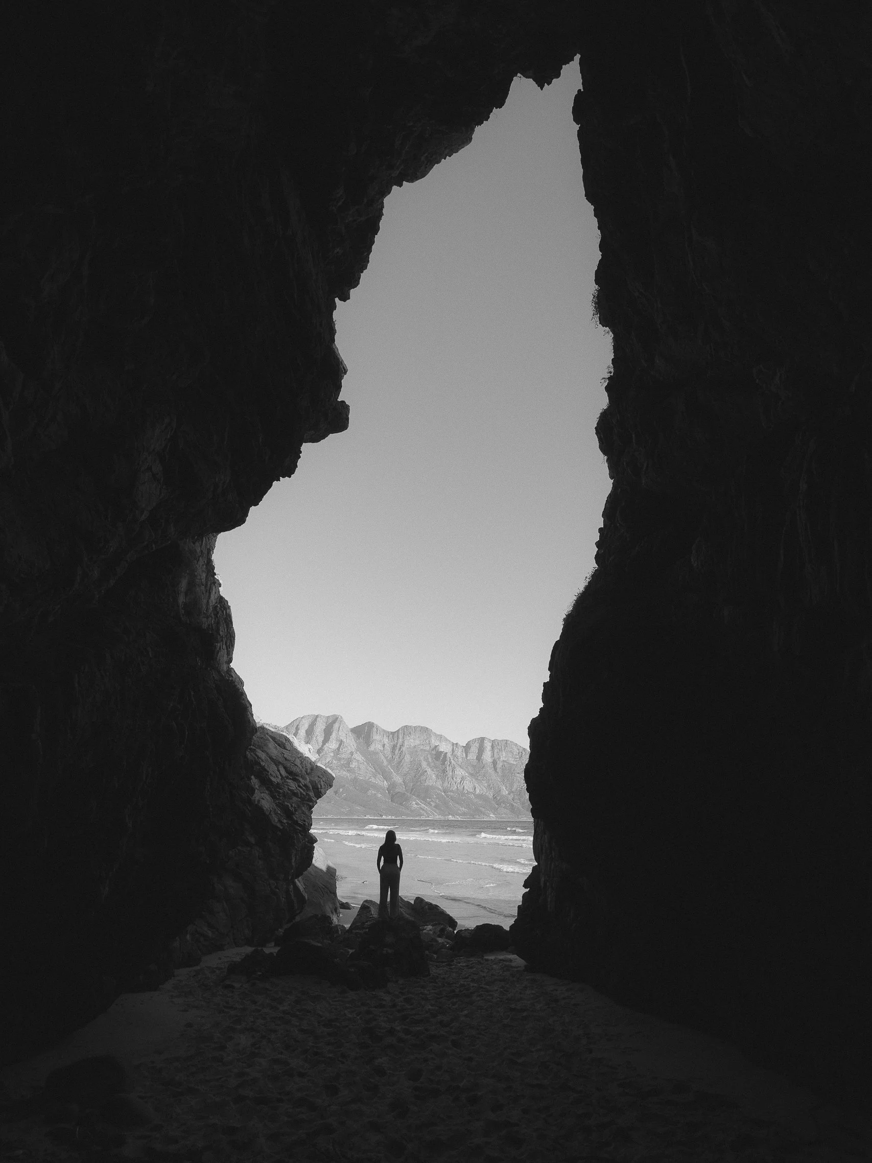 The coast framed by a cave at Kogel Bay, South Africa