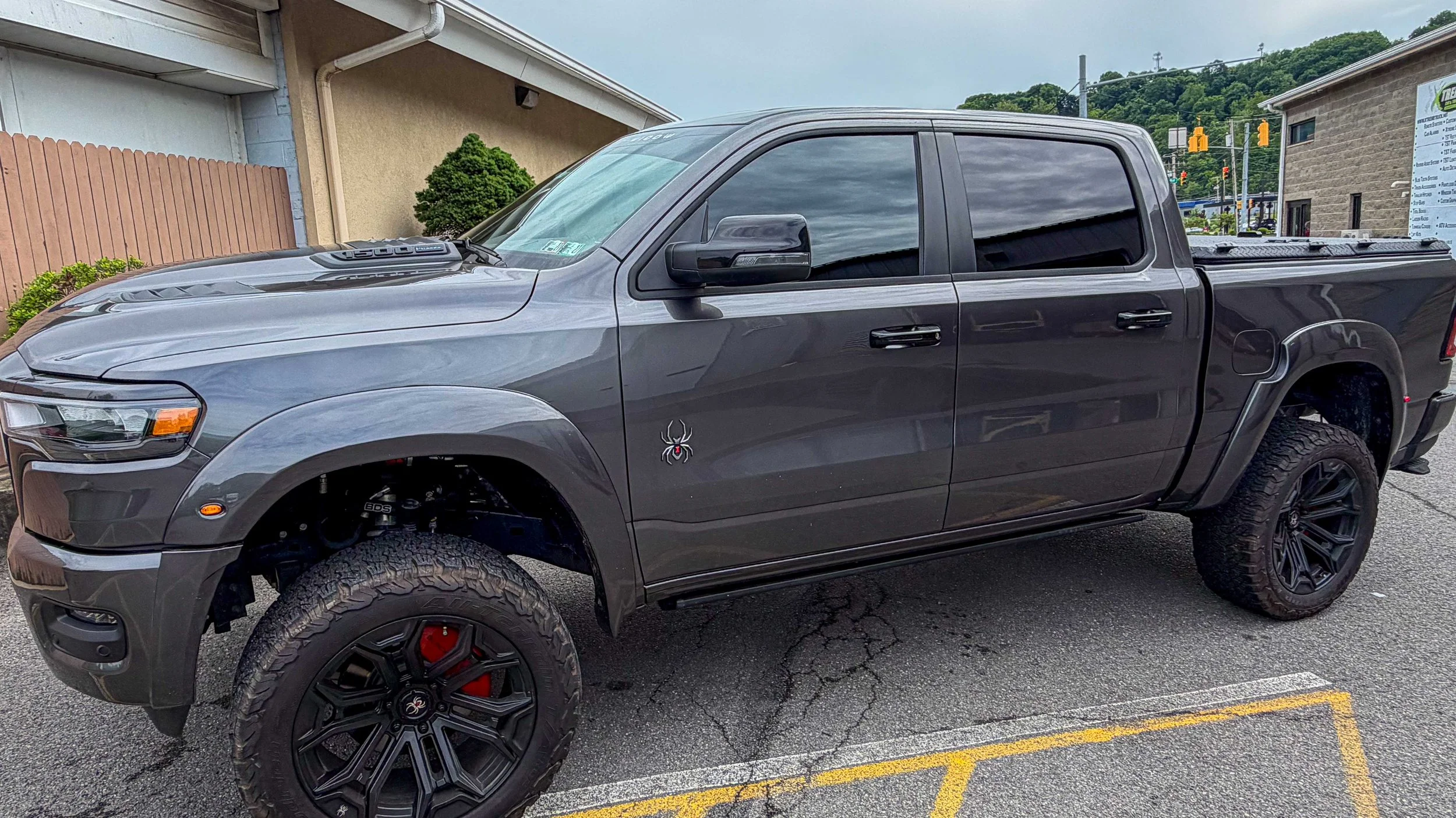 Gray lifted pickup truck with completed XPEL window tint at Xtreme Car and Truck Accessories in Bridgeville PA, serving Pittsburgh and the South Hills