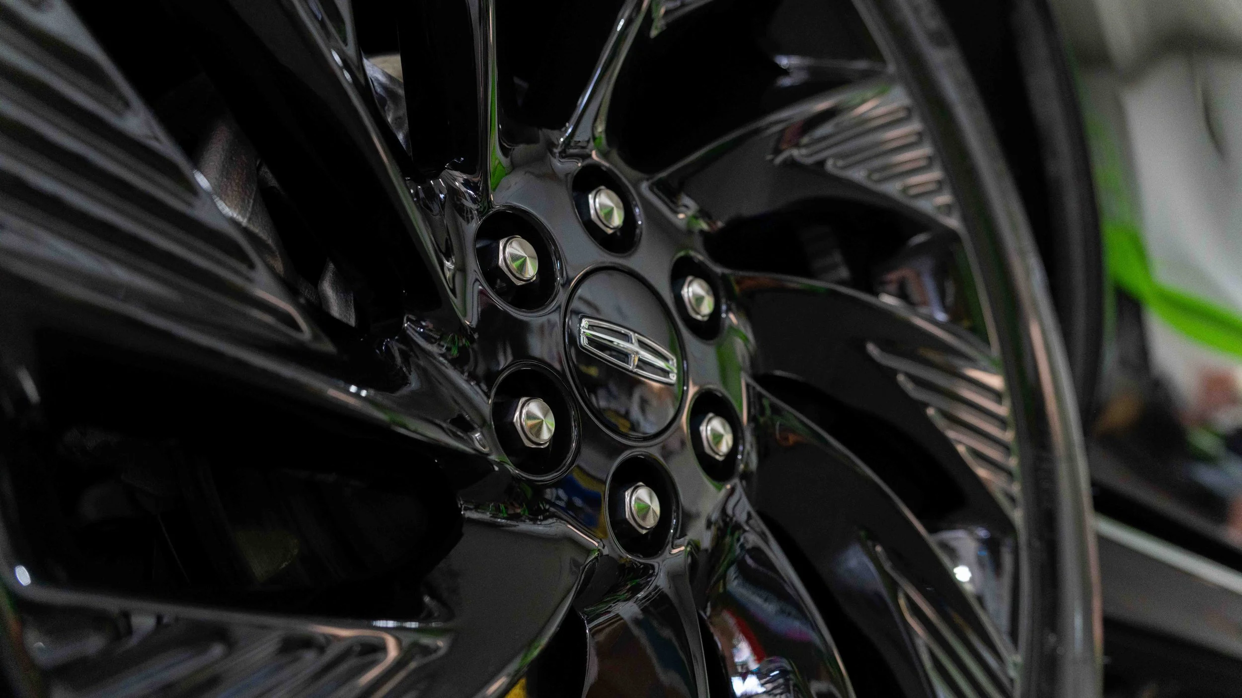 Spotless factory black wheel on a 2026 Lincoln Navigator after professional auto detailing at Xtreme Car & Truck, Bridgeville PA