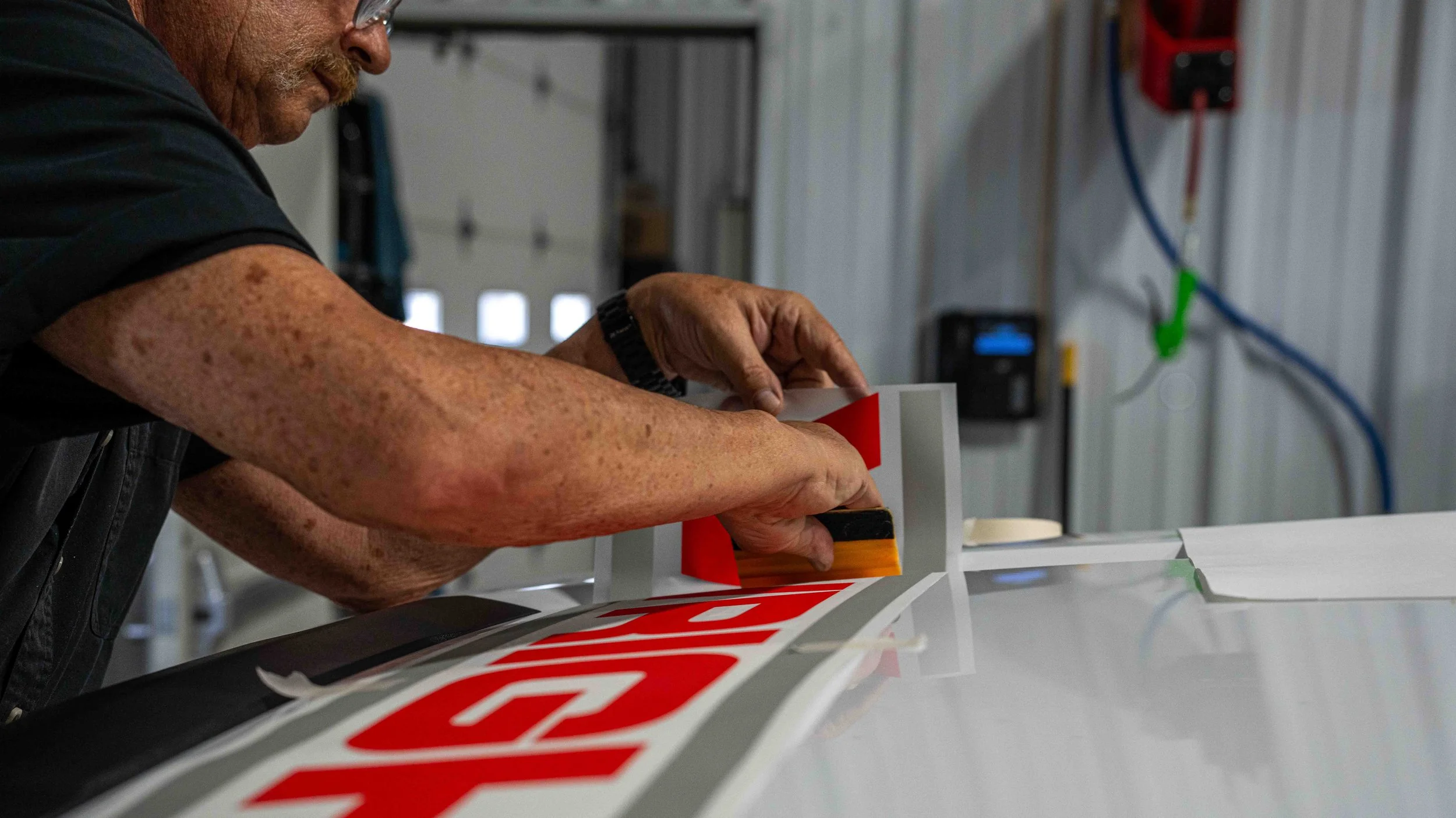 Professional vinyl graphics installation for W.D. Wright commercial truck lettering and fleet decals at Xtreme Car and Truck Accessories near Pittsburgh