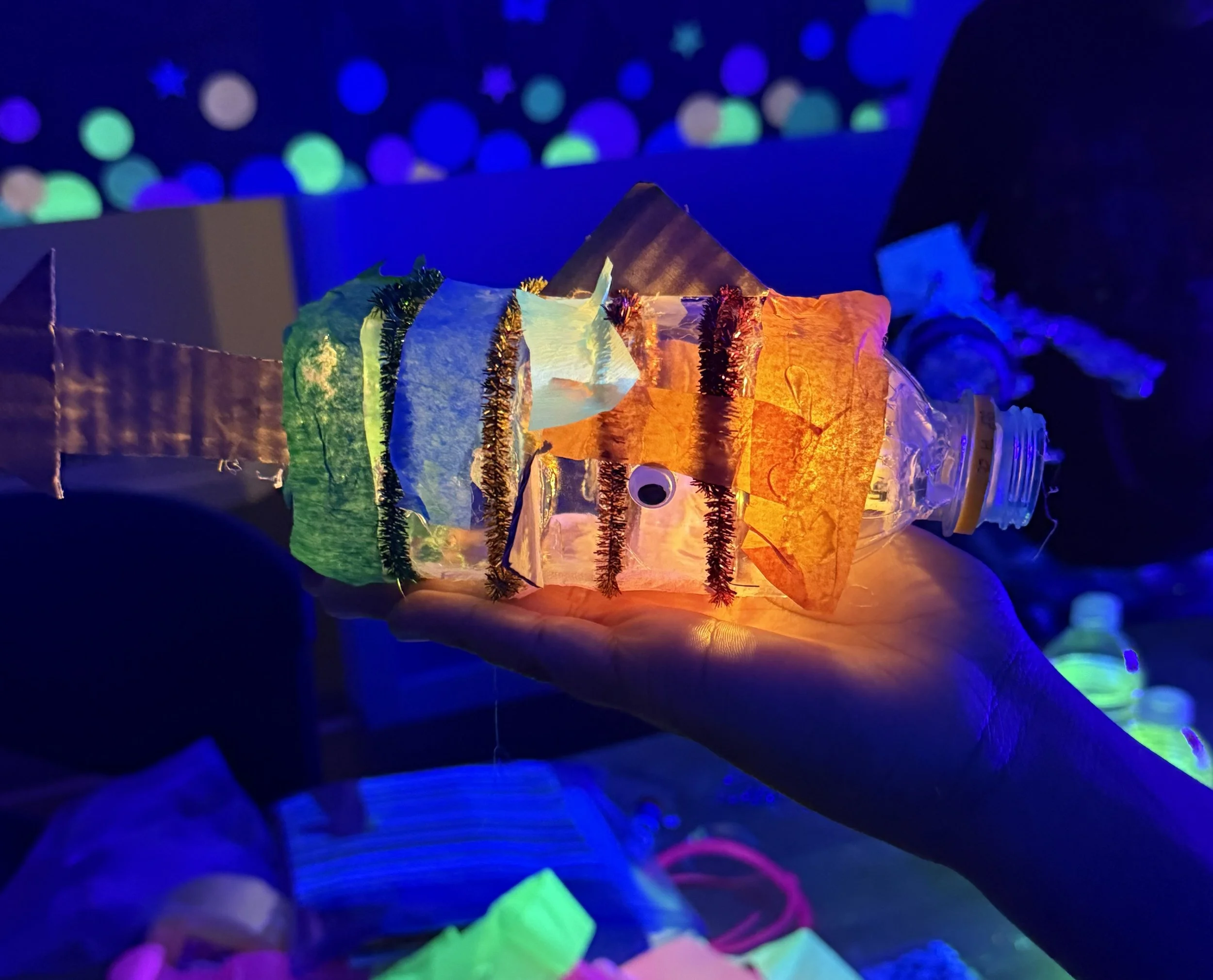 A glowing fish invented from recycled materials