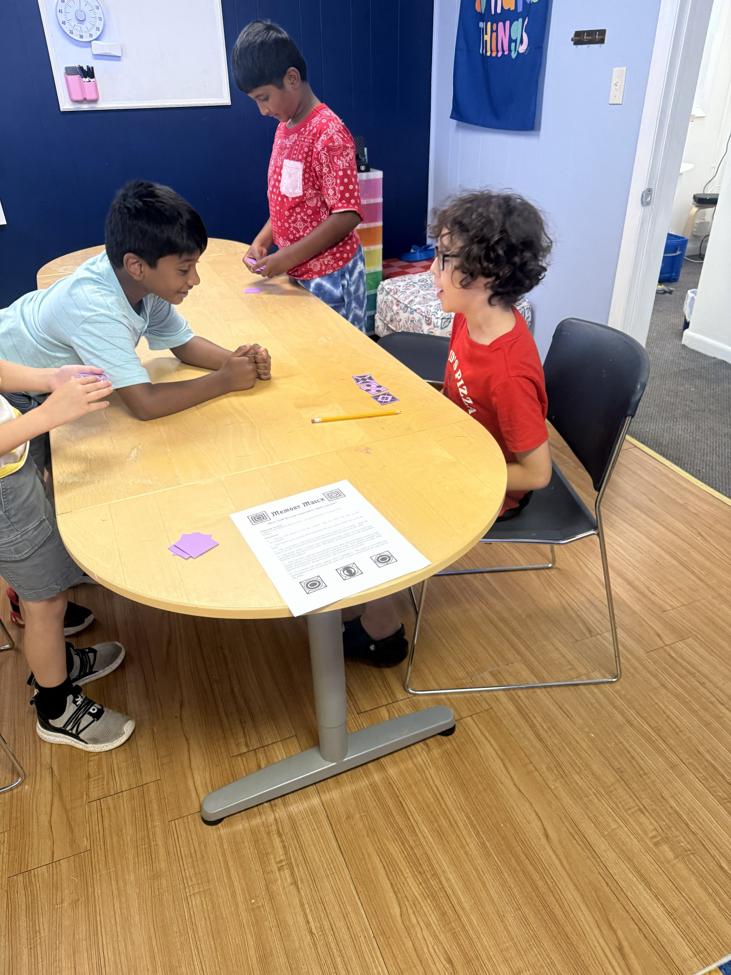 Students collaborating through a small-group learning challenge