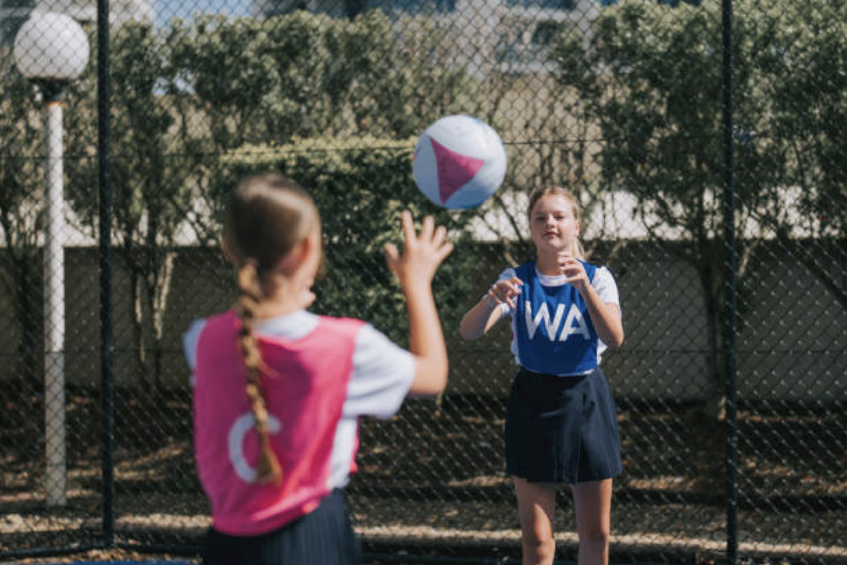 Child Playing Netball