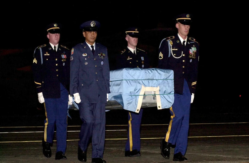 United Nations Honor Guard carrying a transfer case during a Korean War remains repatriation ceremony