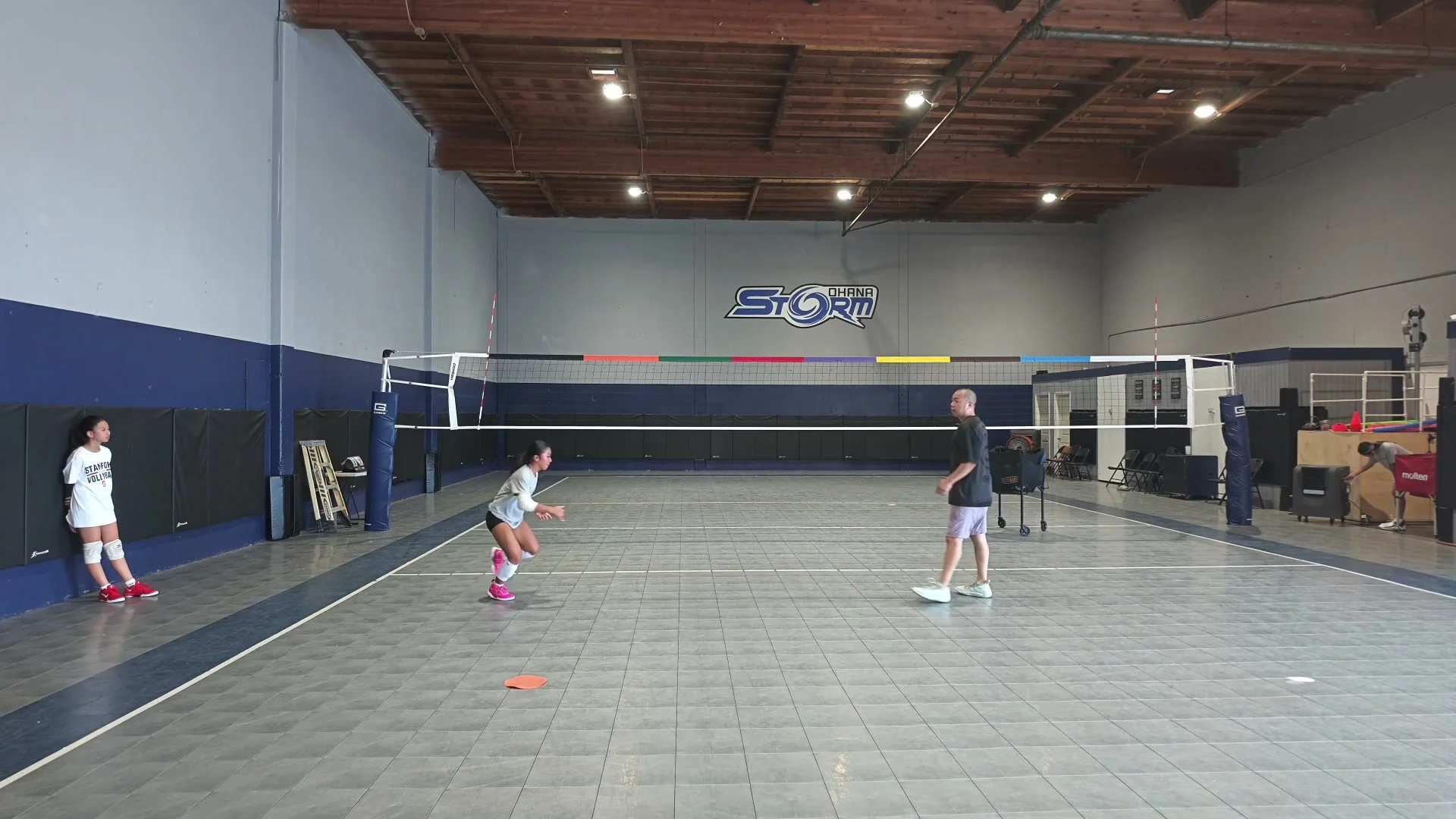 Coach Chris guiding an athlete in the original foundation preview