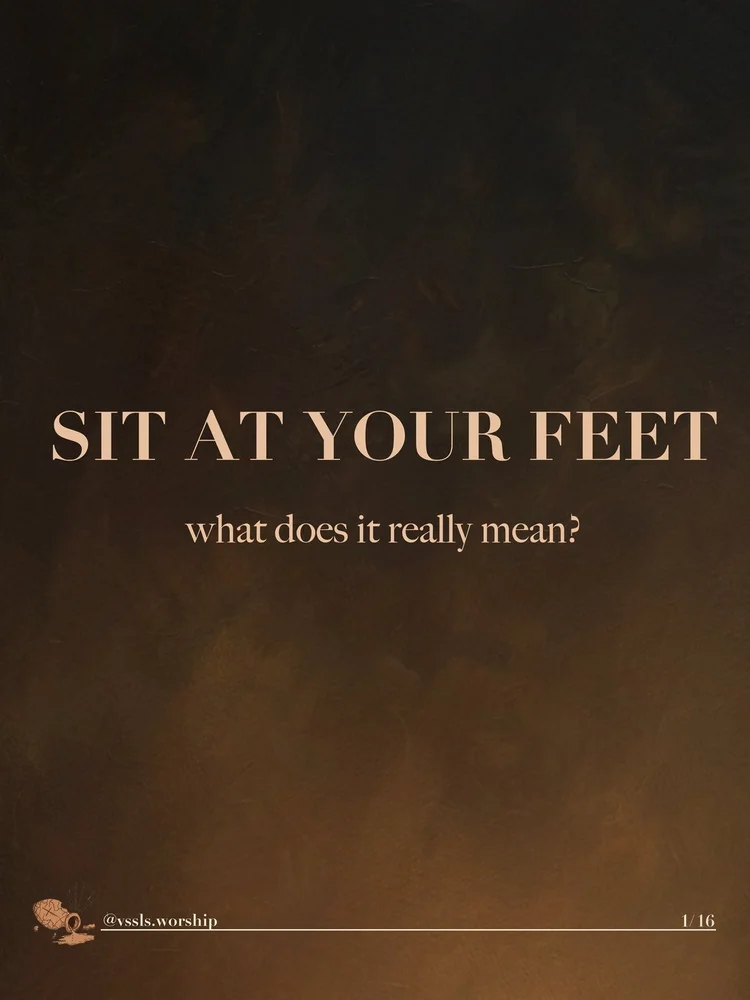 A plain warm-brown background. Text: SIT AT YOUR FEET what does it really mean?
