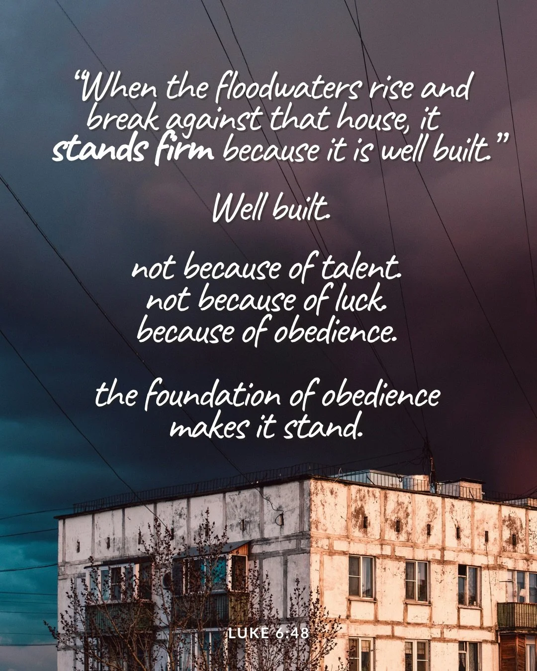 An old, weathered apartment building beneath a dark, stormy sky. Text: “When the floodwaters rise and break against that house, it stands firm because it is well built.” Well built. not because of talent. not because of luck. because of obedience. the foundation of obedience makes it stand. Luke 6:48