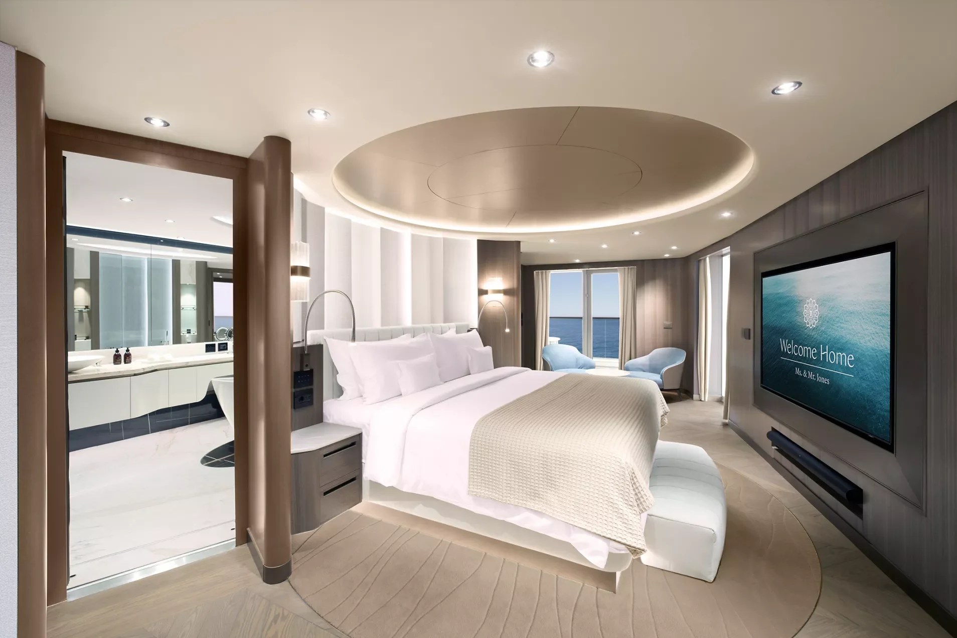 Owner’s Residence bedroom with king bed and a doorway to the marble bathroom