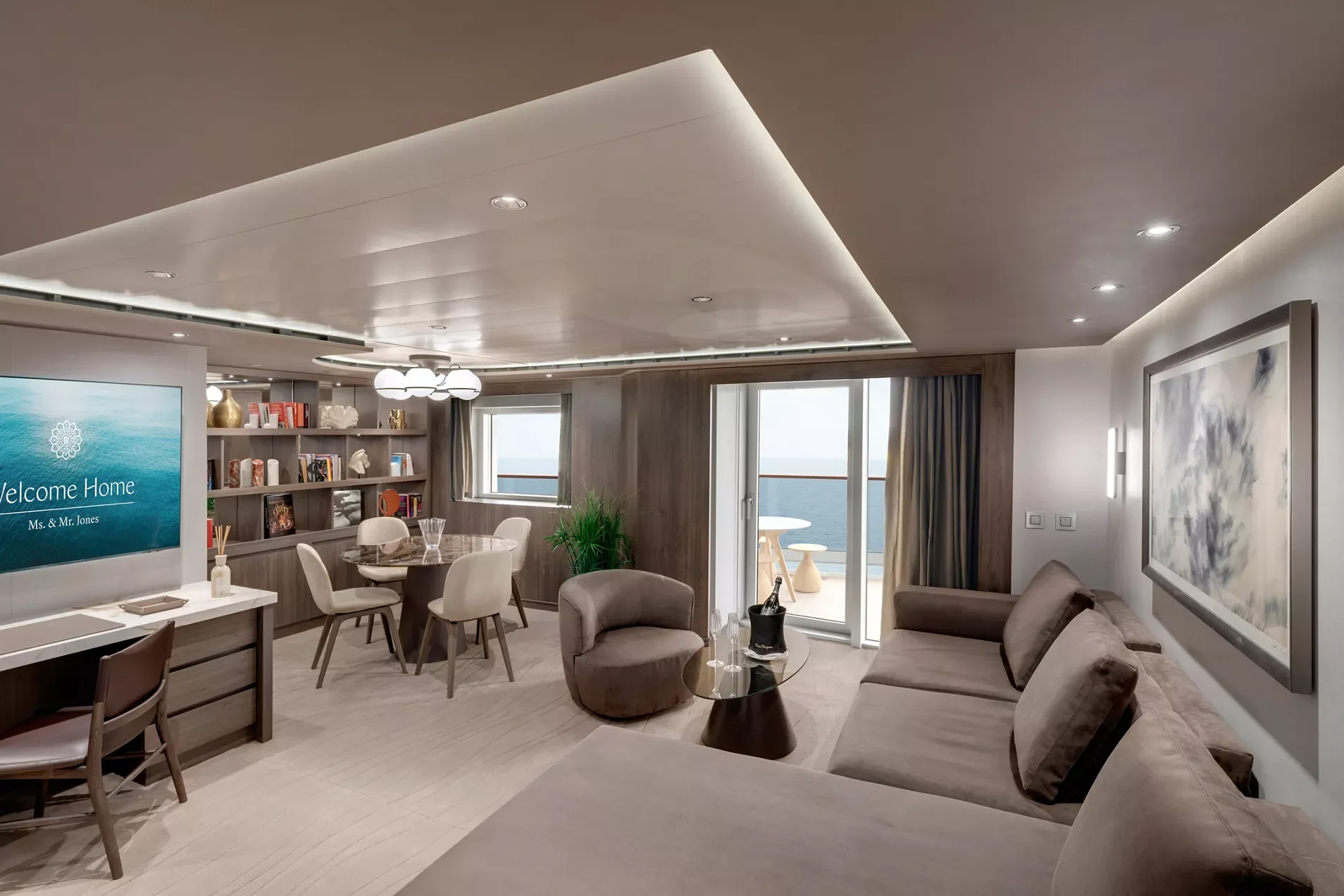 Explora Journeys Cocoon Residence living and dining room with a door to the sea-view terrace